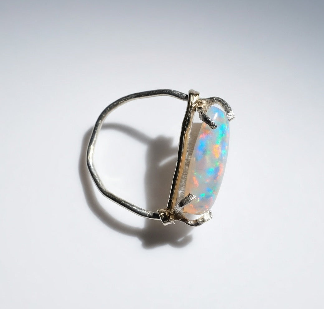 Size 10 4.5c natural opal set in sterling silver and yellow 10k gold