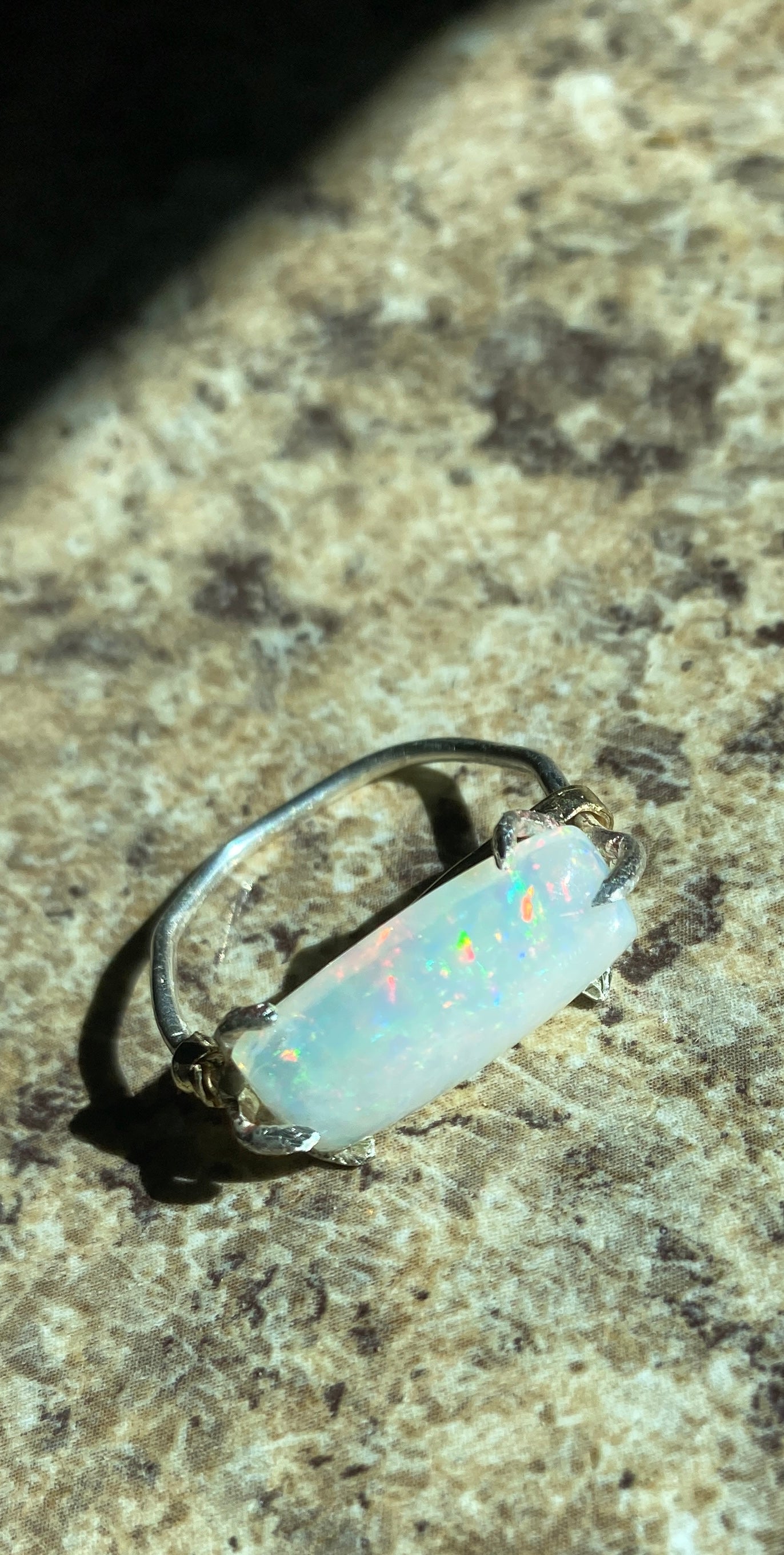 Size 10 4.5c natural opal set in sterling silver and yellow 10k gold