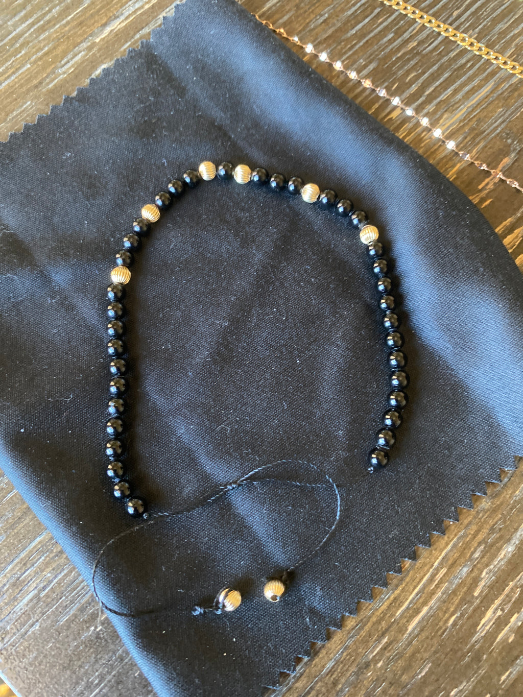 4mm 14k gold and natural black onyx bead bracelet
